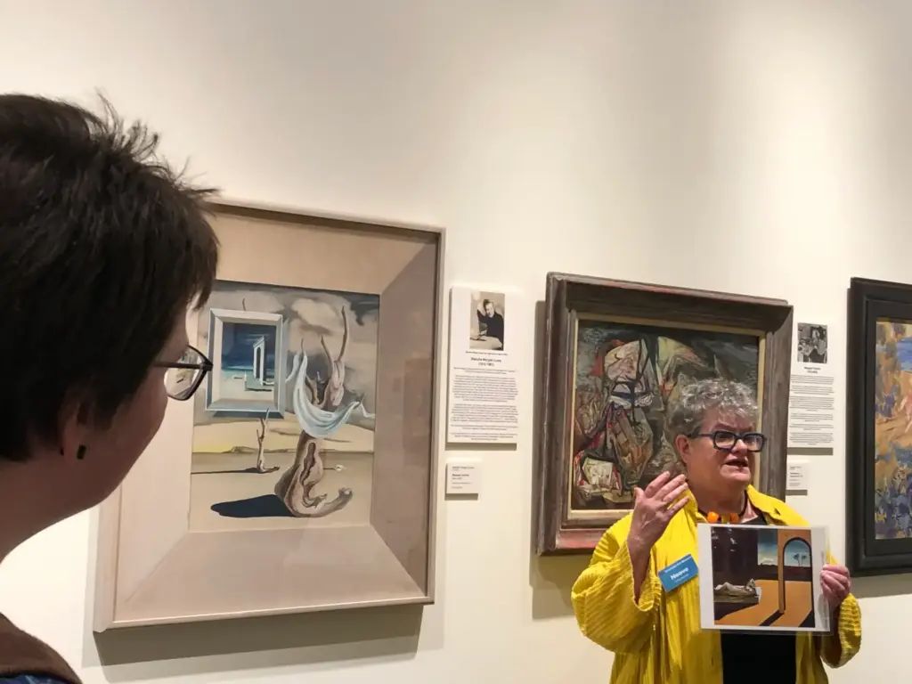 Visitor viewing Pacific Northwest artwork in the museum
