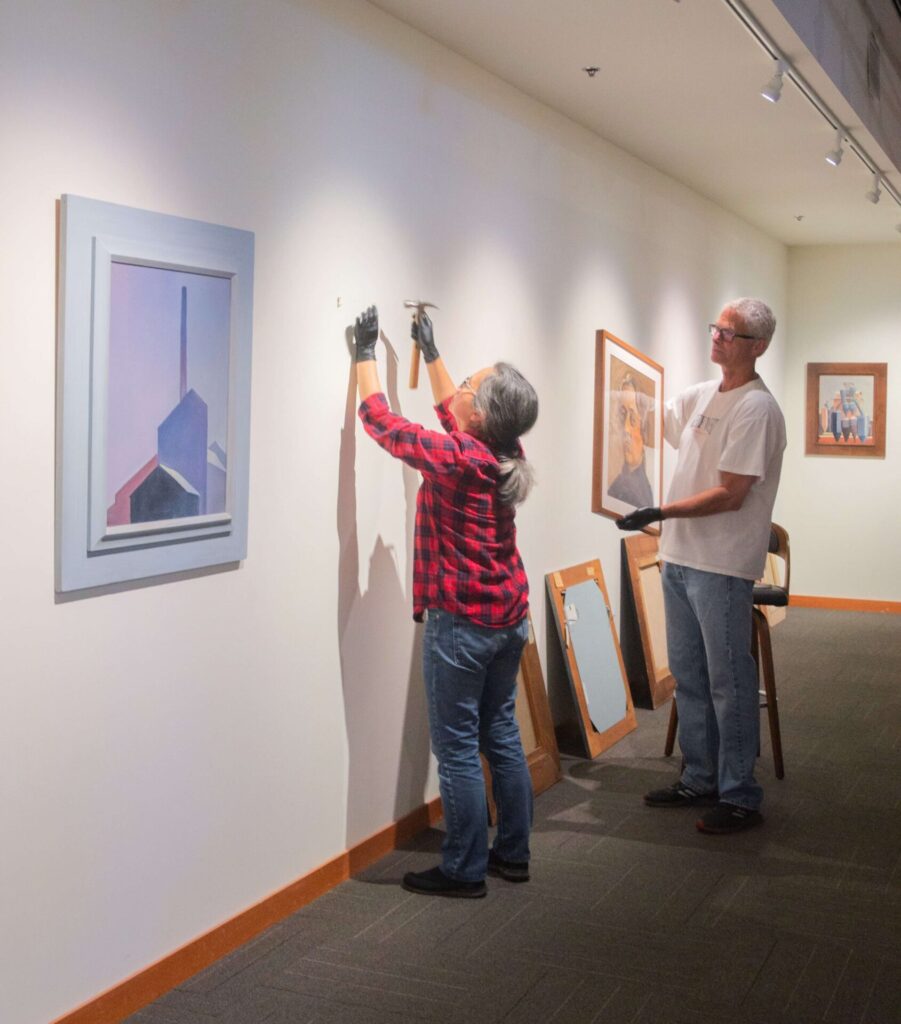 Volunteers assisting visitors at Cascadia Art Museum
